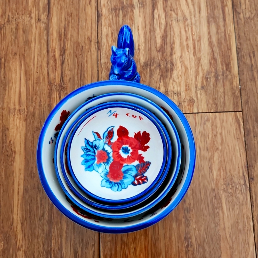 Anthropology hand painted porcelain measuring cups.  New - will list 1 week only